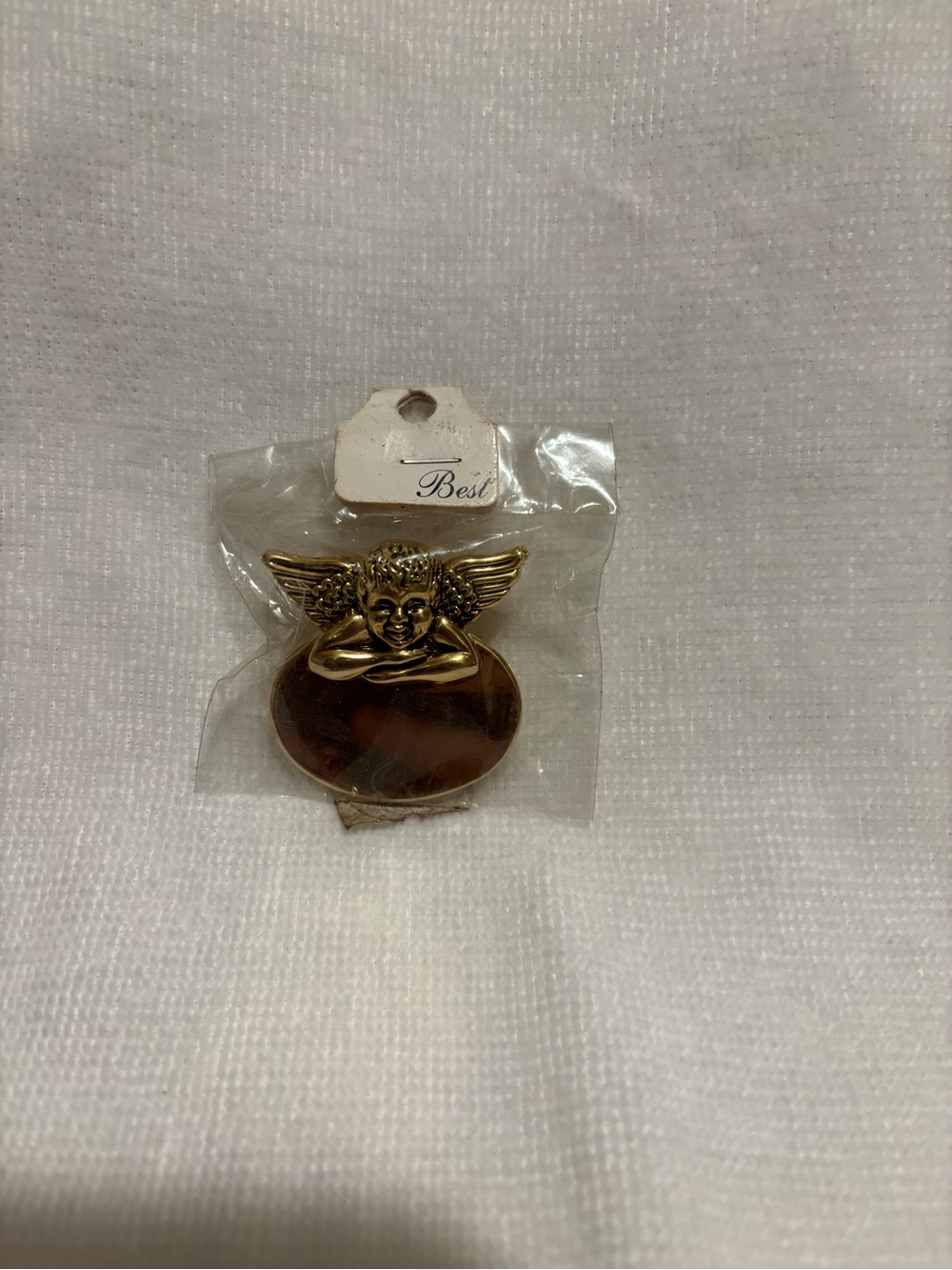 Vintage best gold toned angel brooch